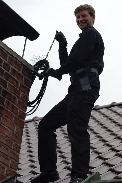 Weaver Chimney technician cleaning a chimney ,near me